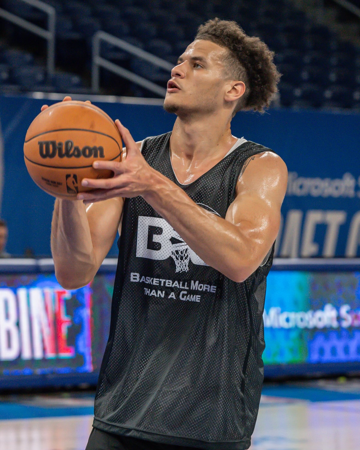 Issa Muhammad shooting a free throw during a professional showcase