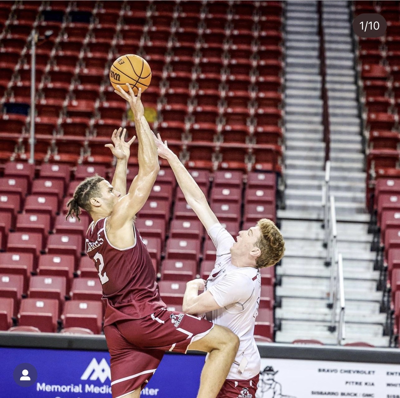 Issa Muhammad contesting a jump ball for New Mexico State